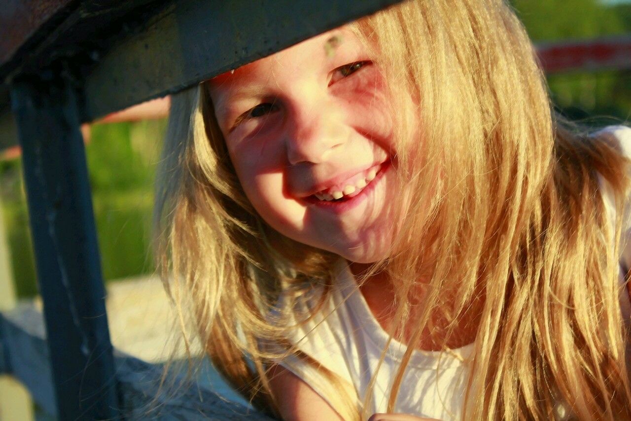 Close-up portrait of smiling girl