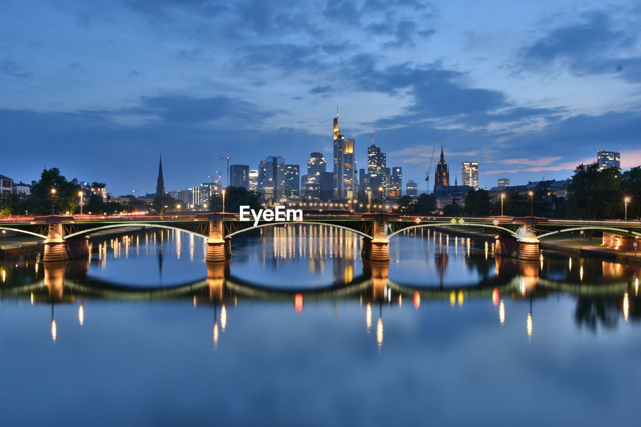 Reflection of illuminated buildings in water