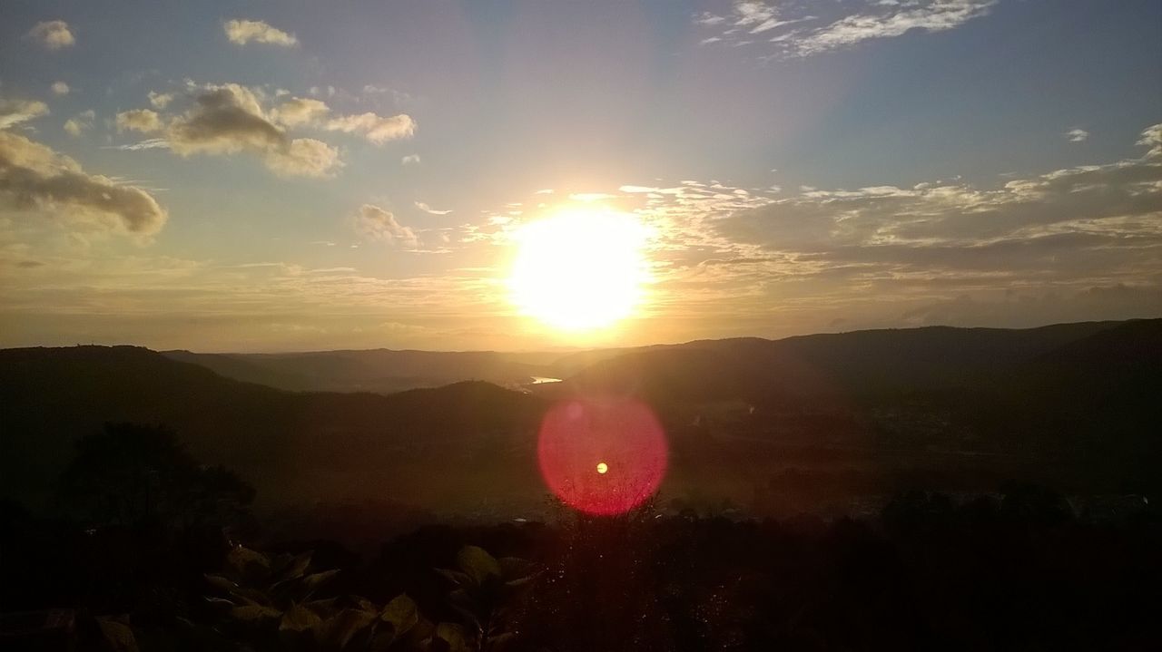 SUNSET OVER MOUNTAINS