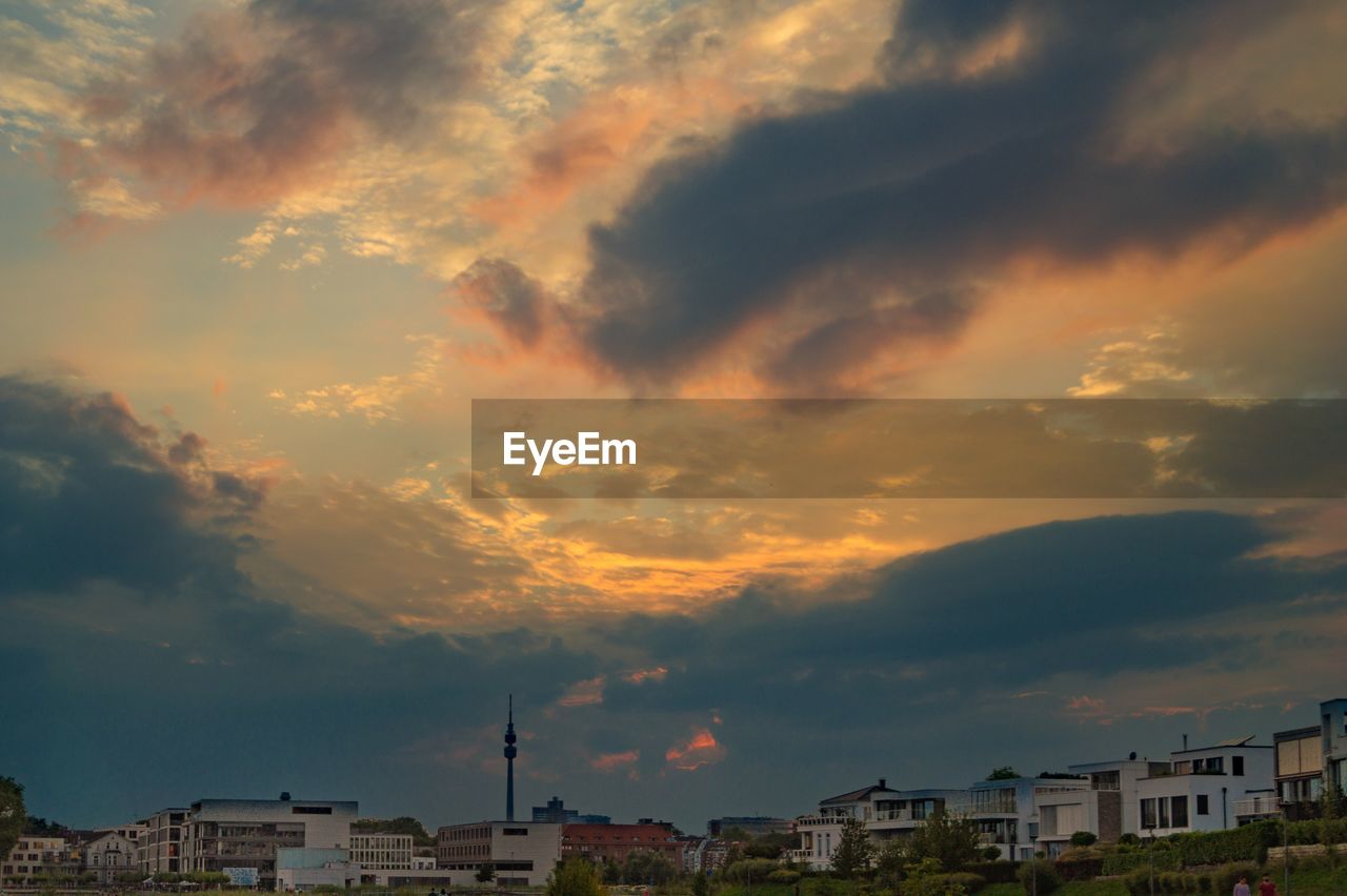 Cityscape against sky during sunset