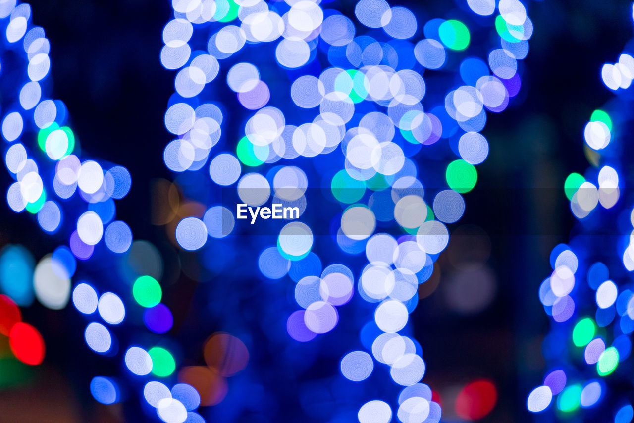 Defocused image of illuminated christmas lights