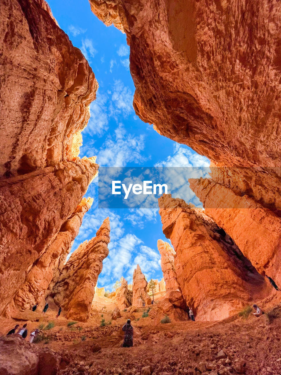 Low angle view of rock formations against sky