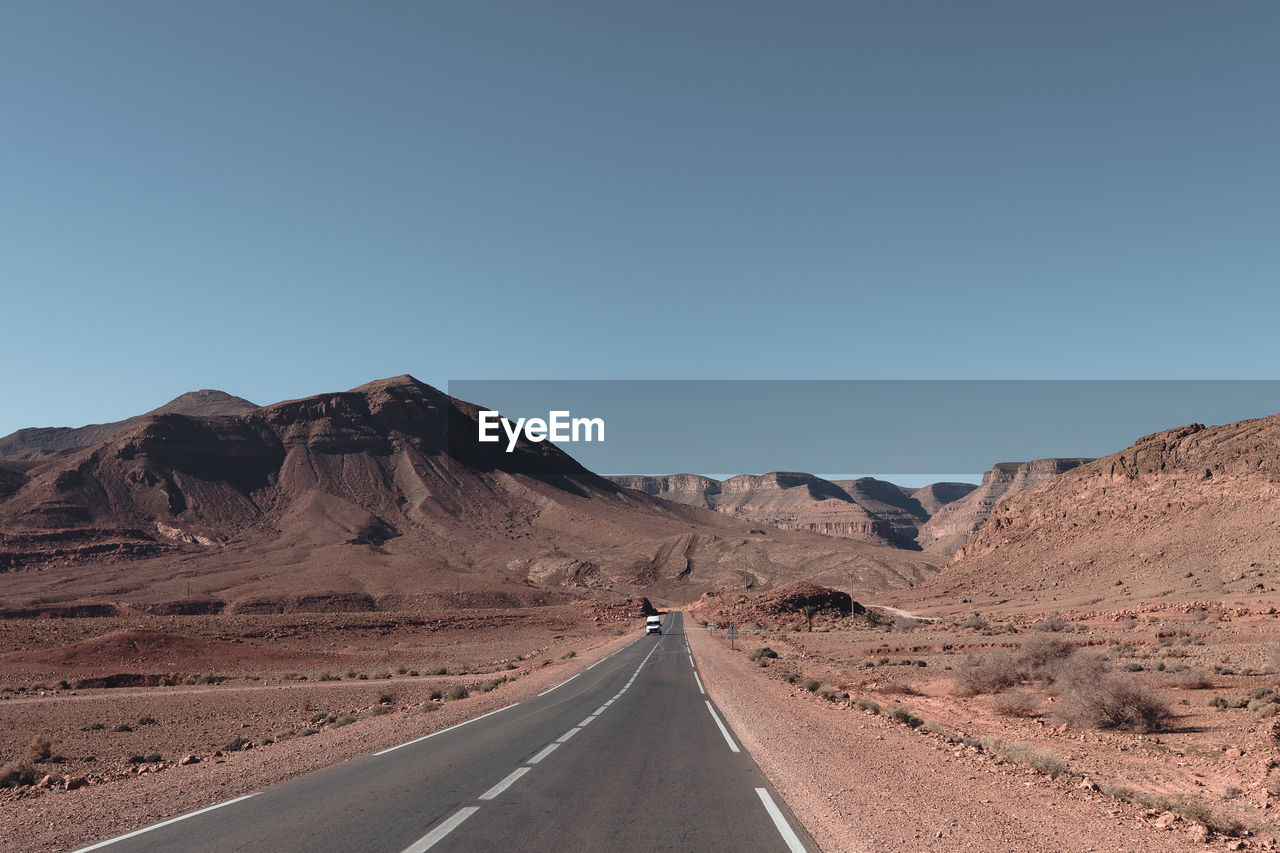 SCENIC VIEW OF ROAD AGAINST CLEAR SKY