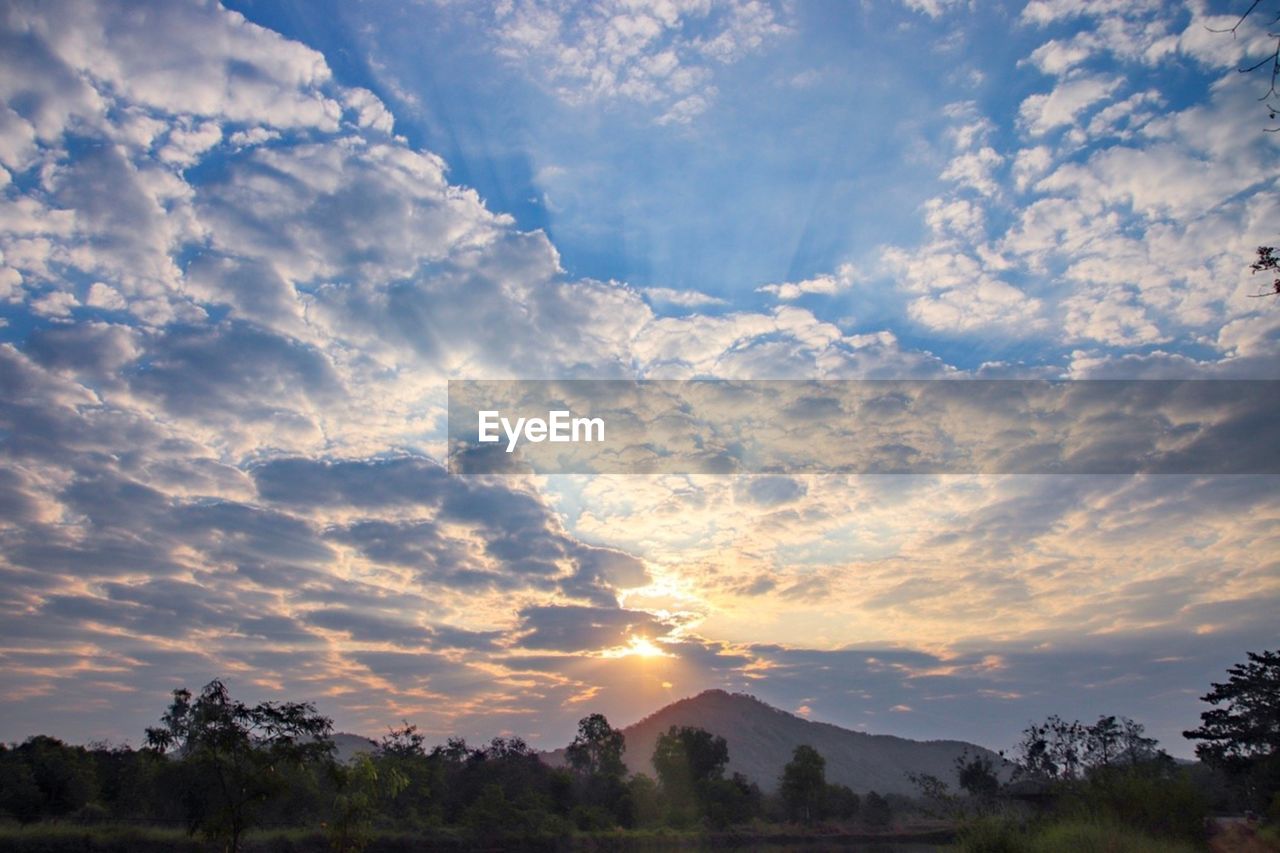 Scenic view of landscape against sky during sunset