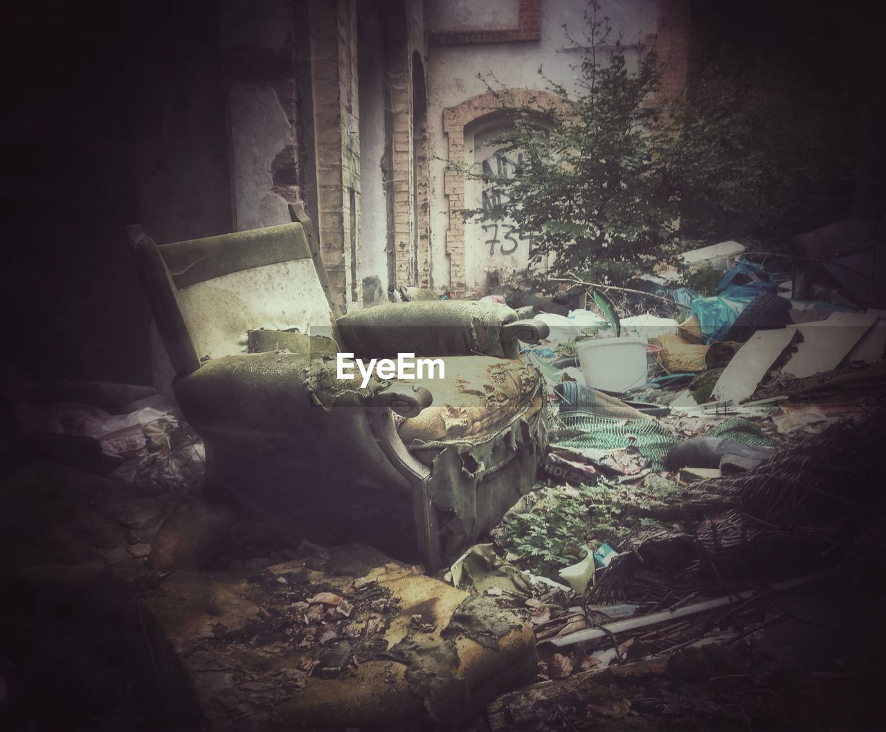 GARBAGE BIN ON THE GROUND