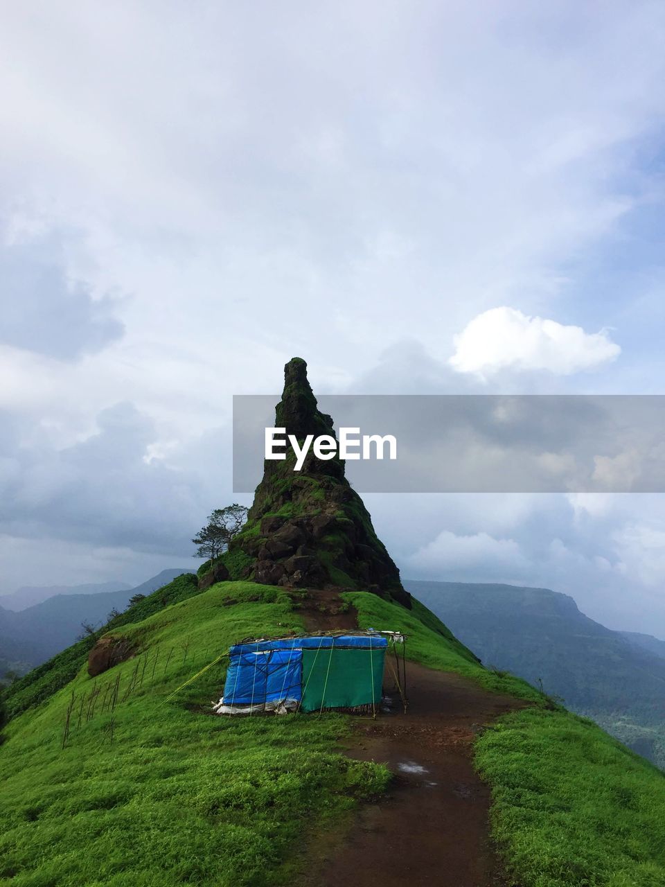 Built structure on land against sky