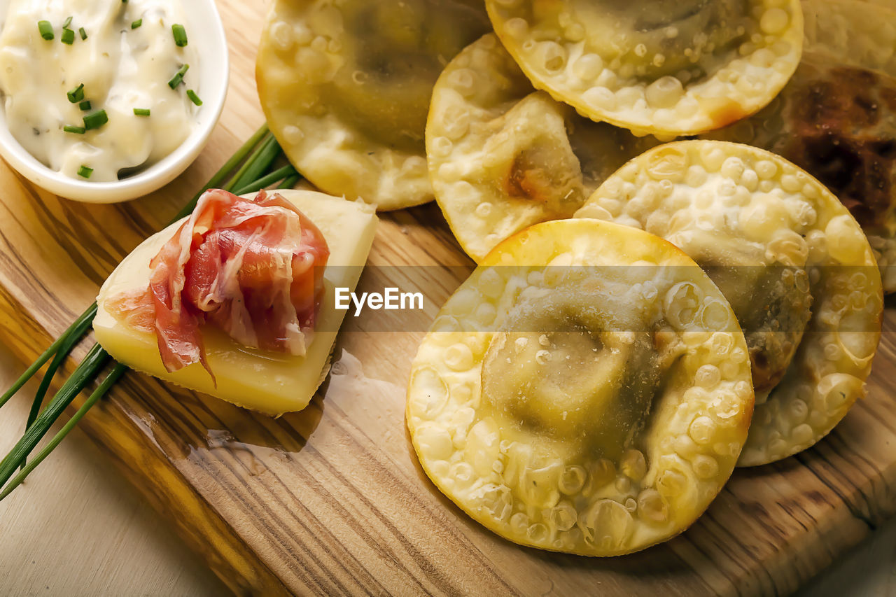 Close-up of food on cutting board over table