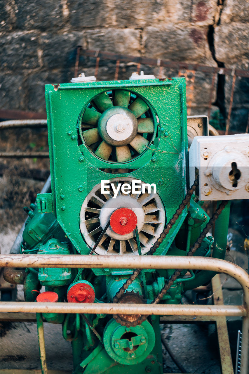 CLOSE-UP OF OLD MACHINERY