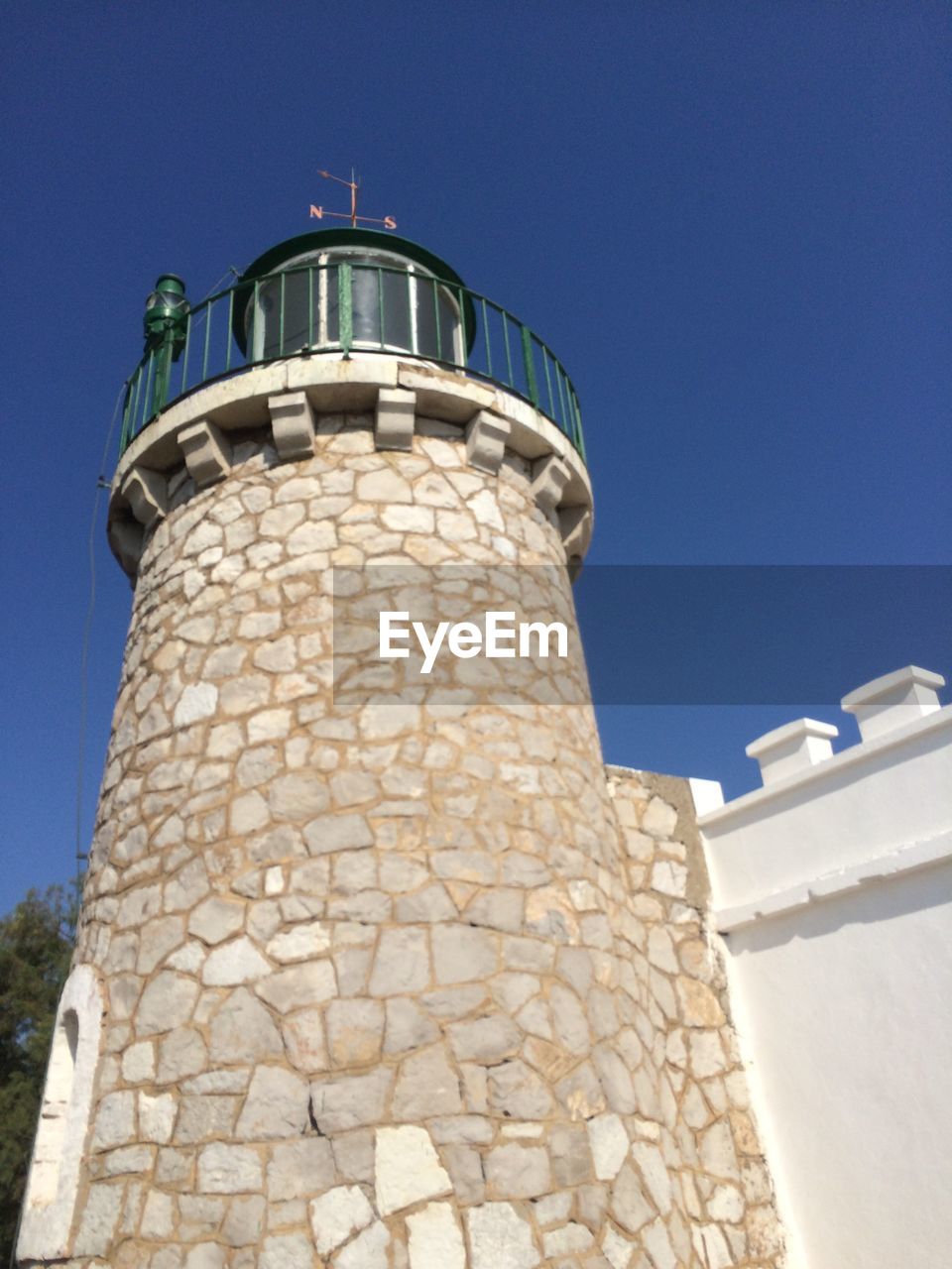 LOW ANGLE VIEW OF TOWER AGAINST CLEAR SKY