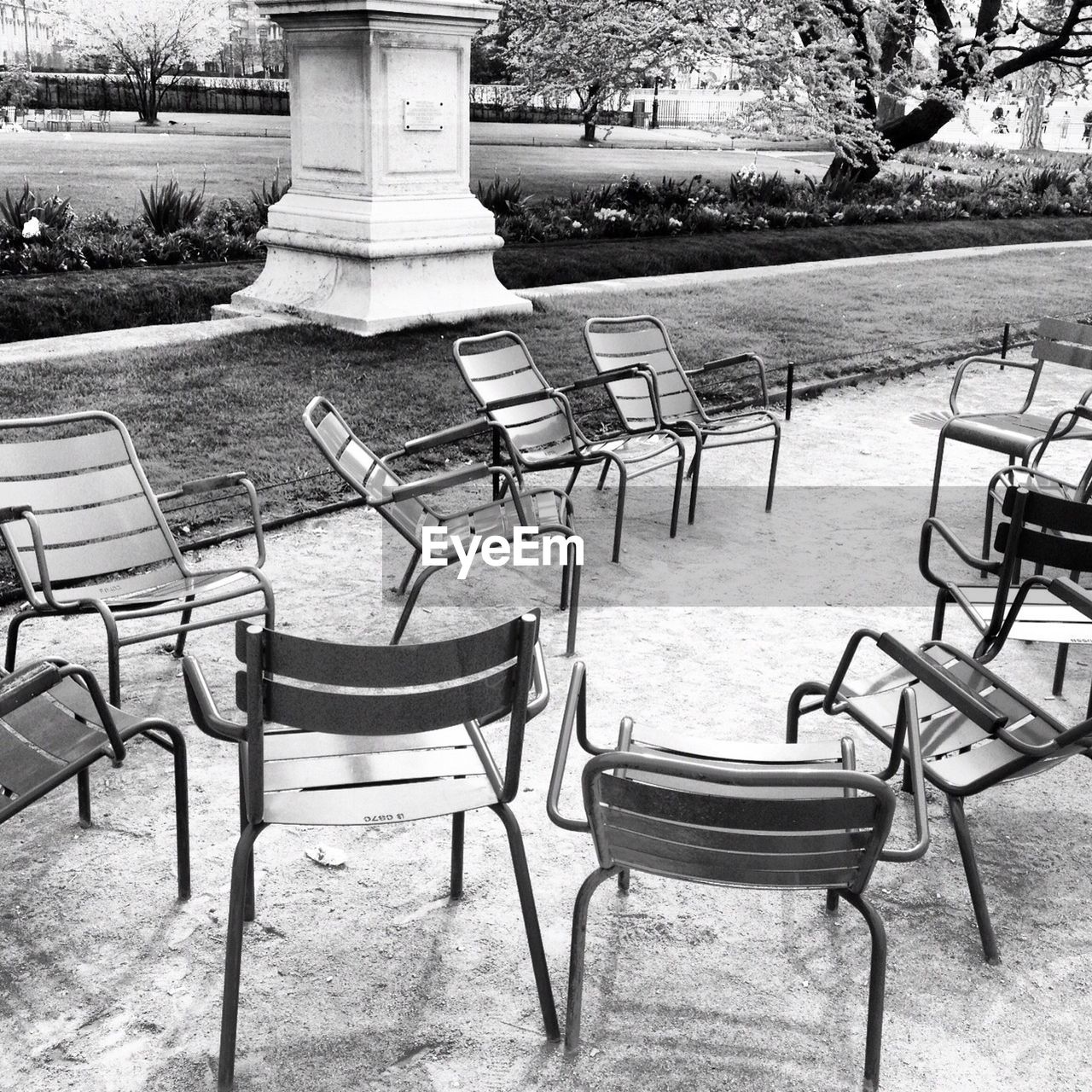 Empty chairs at park