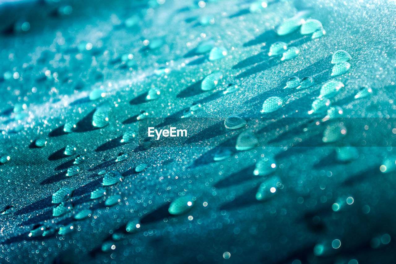 Close-up of water drops on glass