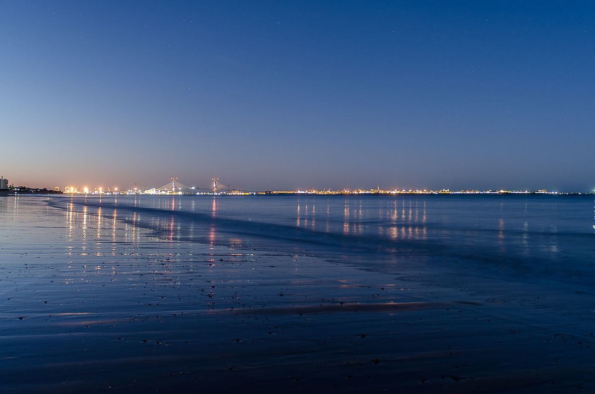 VIEW OF CALM SEA AT NIGHT