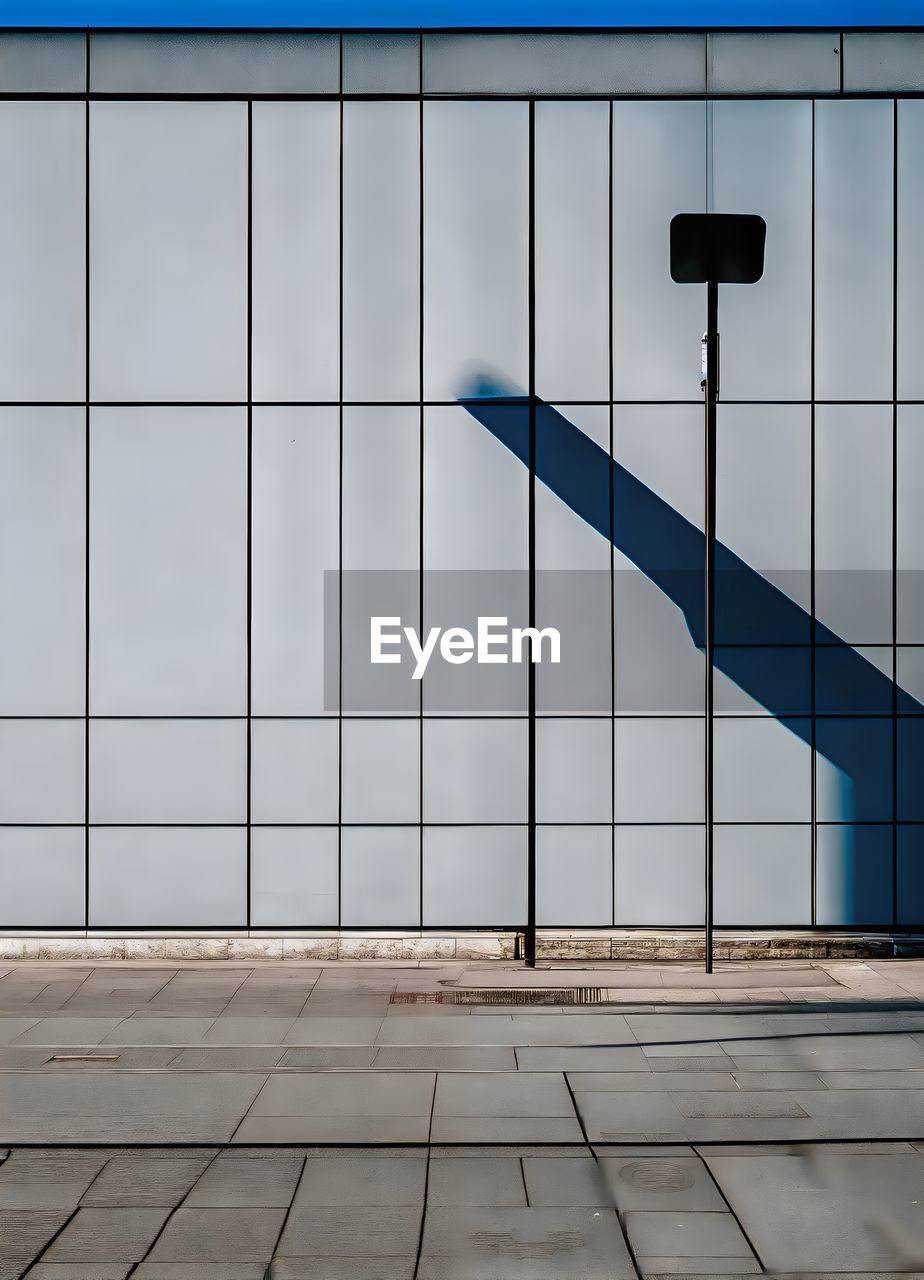 architecture, facade, built structure, wall, building exterior, no people, line, city, building, floor, outdoors, day, business, sky, wall - building feature, nature