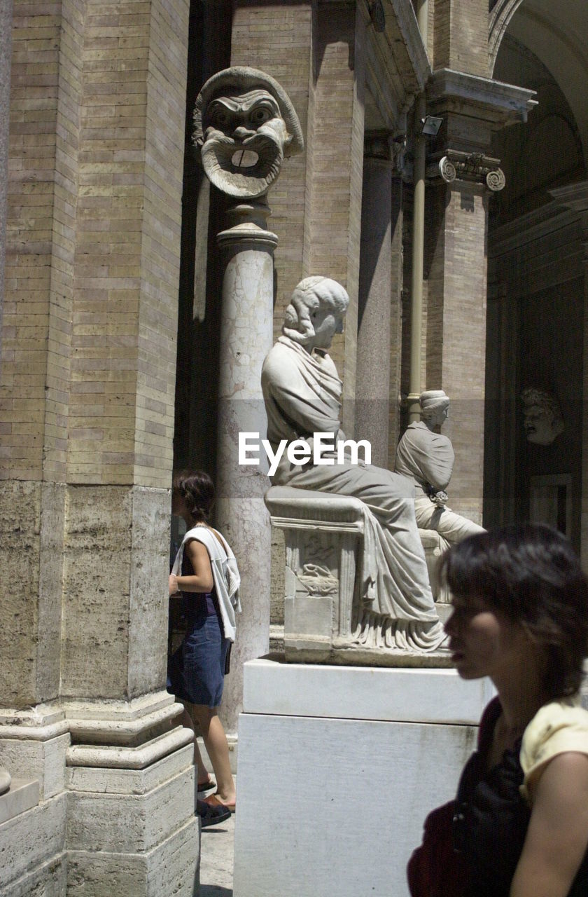 STATUE OF WOMAN IN A TEMPLE