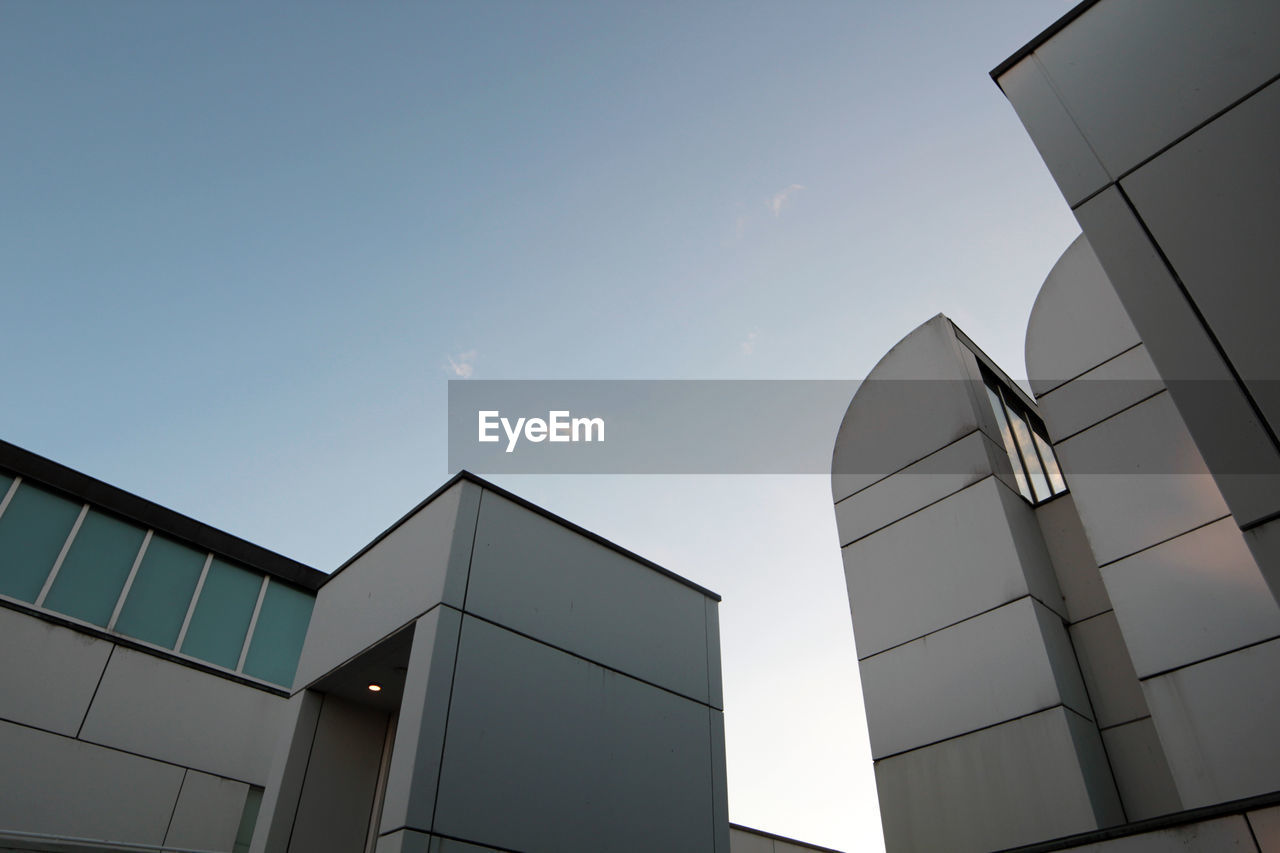 Low angle view of modern building against sky