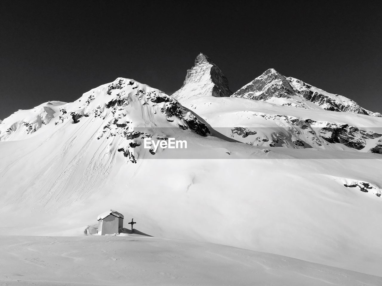 Scenic view of snowcapped mountain against sky