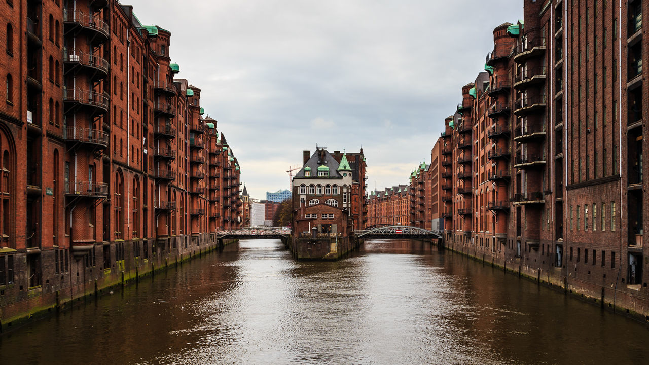 River amidst buildings