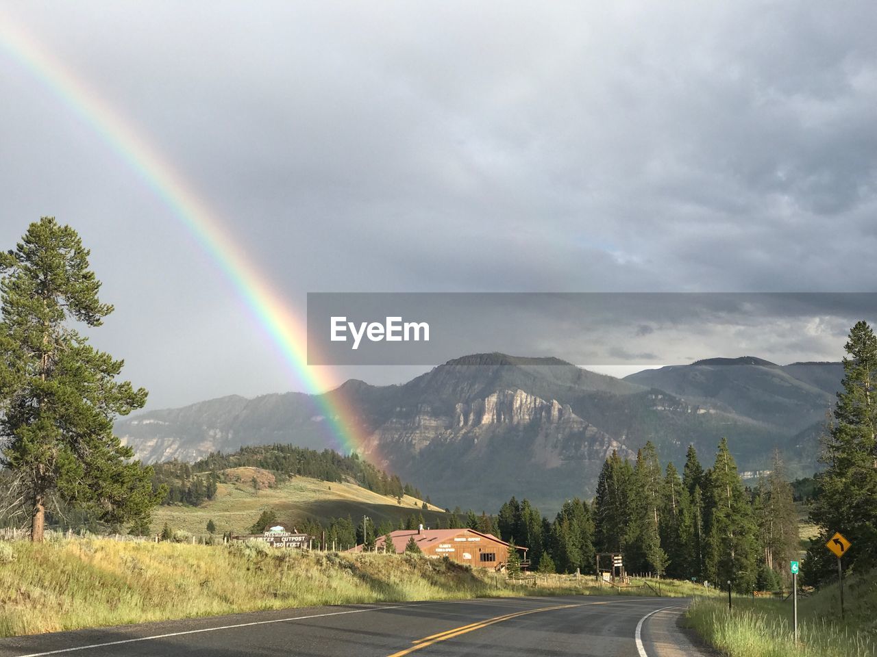 SCENIC VIEW OF RAINBOW OVER MOUNTAIN