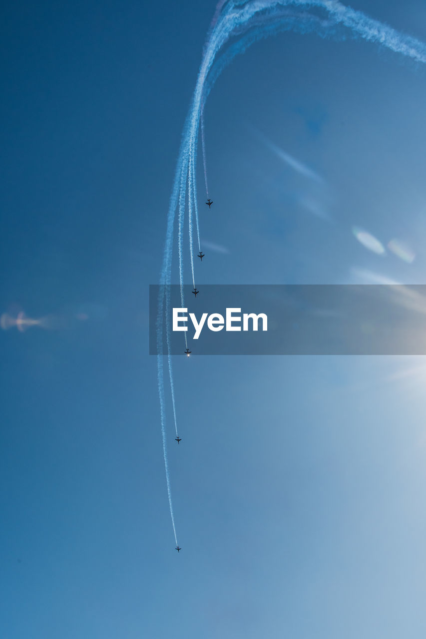 Aerial view of vapor trails in sky