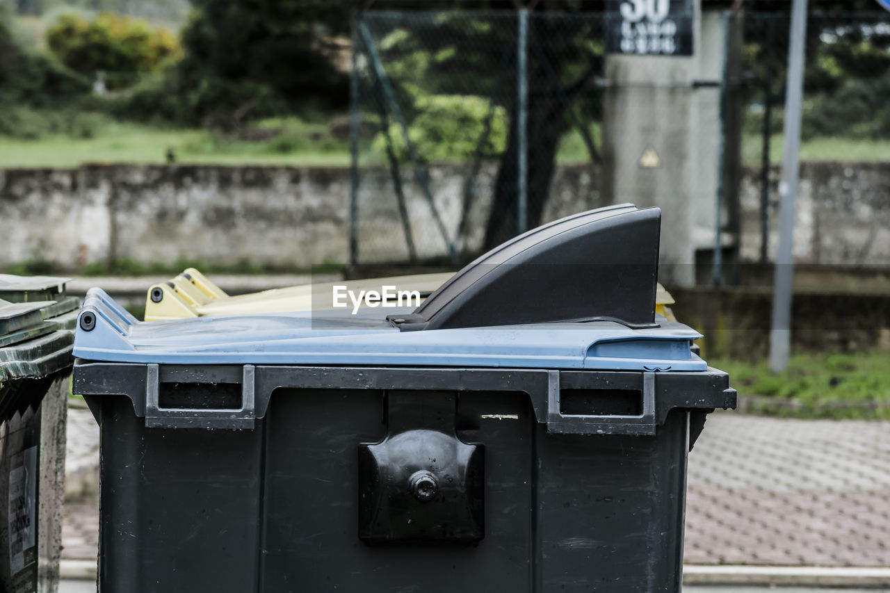 Close-up of garbage bin