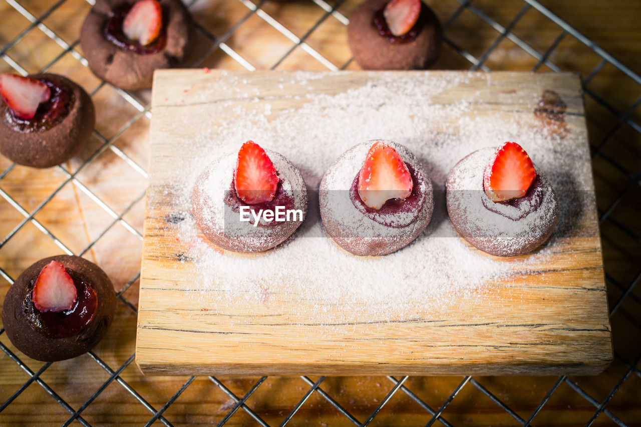 High angle view of fruits on cutting board