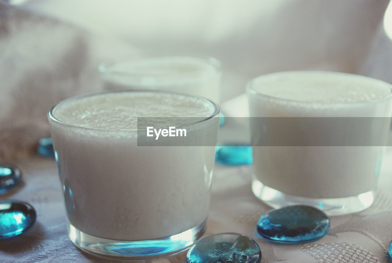 Close-up of coconut mousse served in glasses