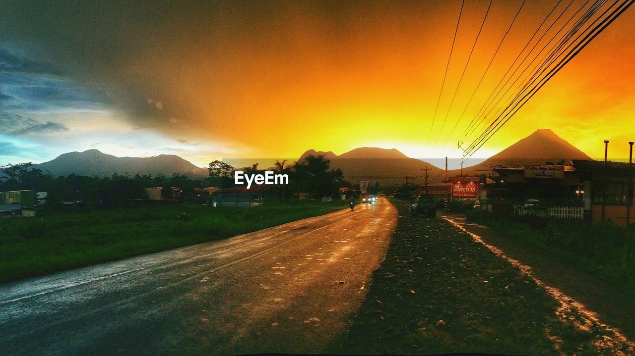 VIEW OF ROAD AT SUNSET