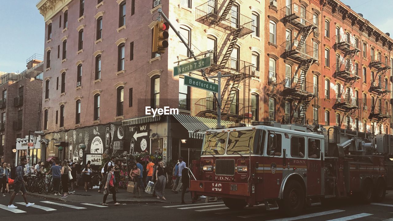 PEOPLE IN FRONT OF BUILDINGS