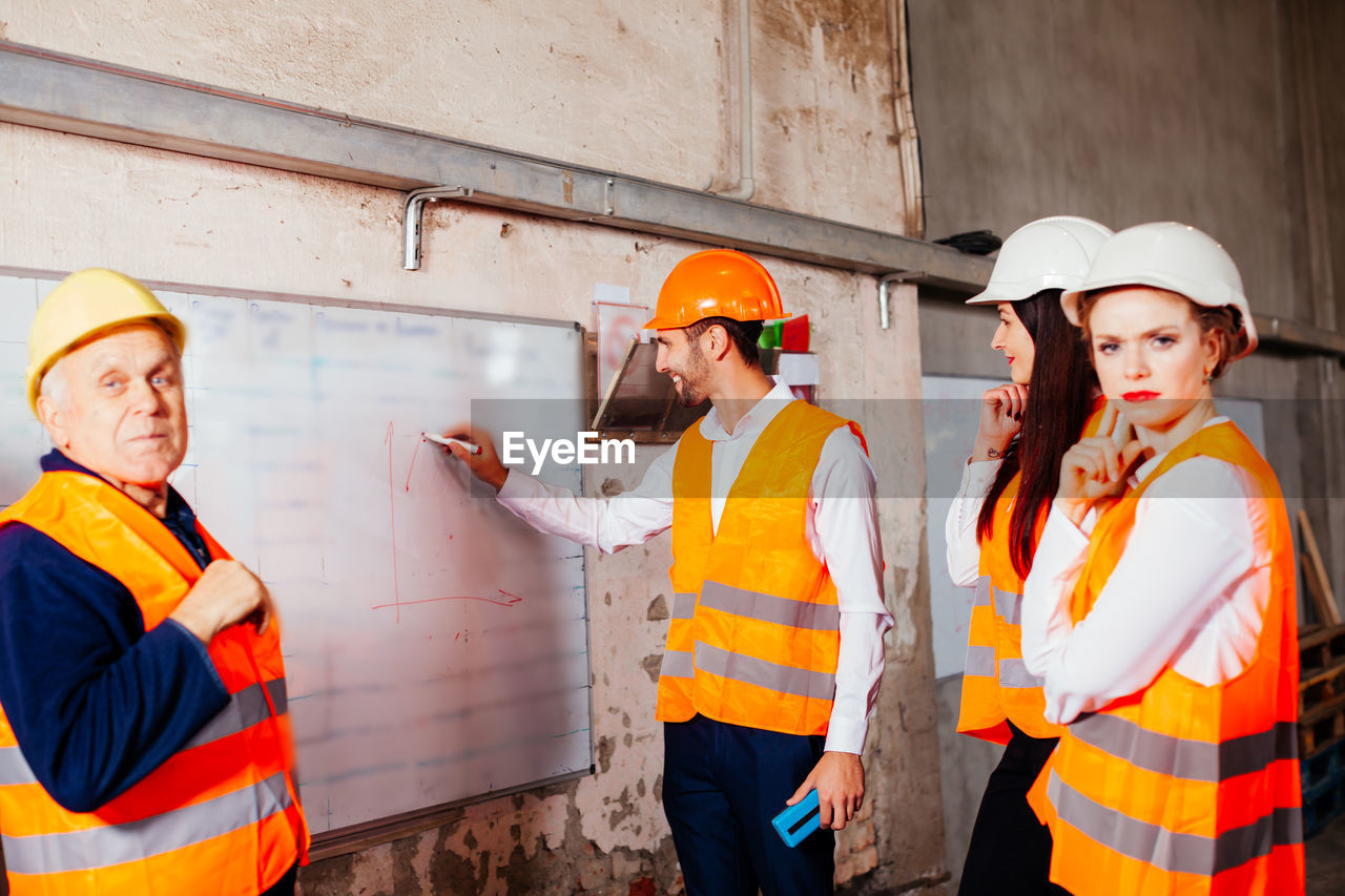 MAN WORKING ON CONSTRUCTION SITE