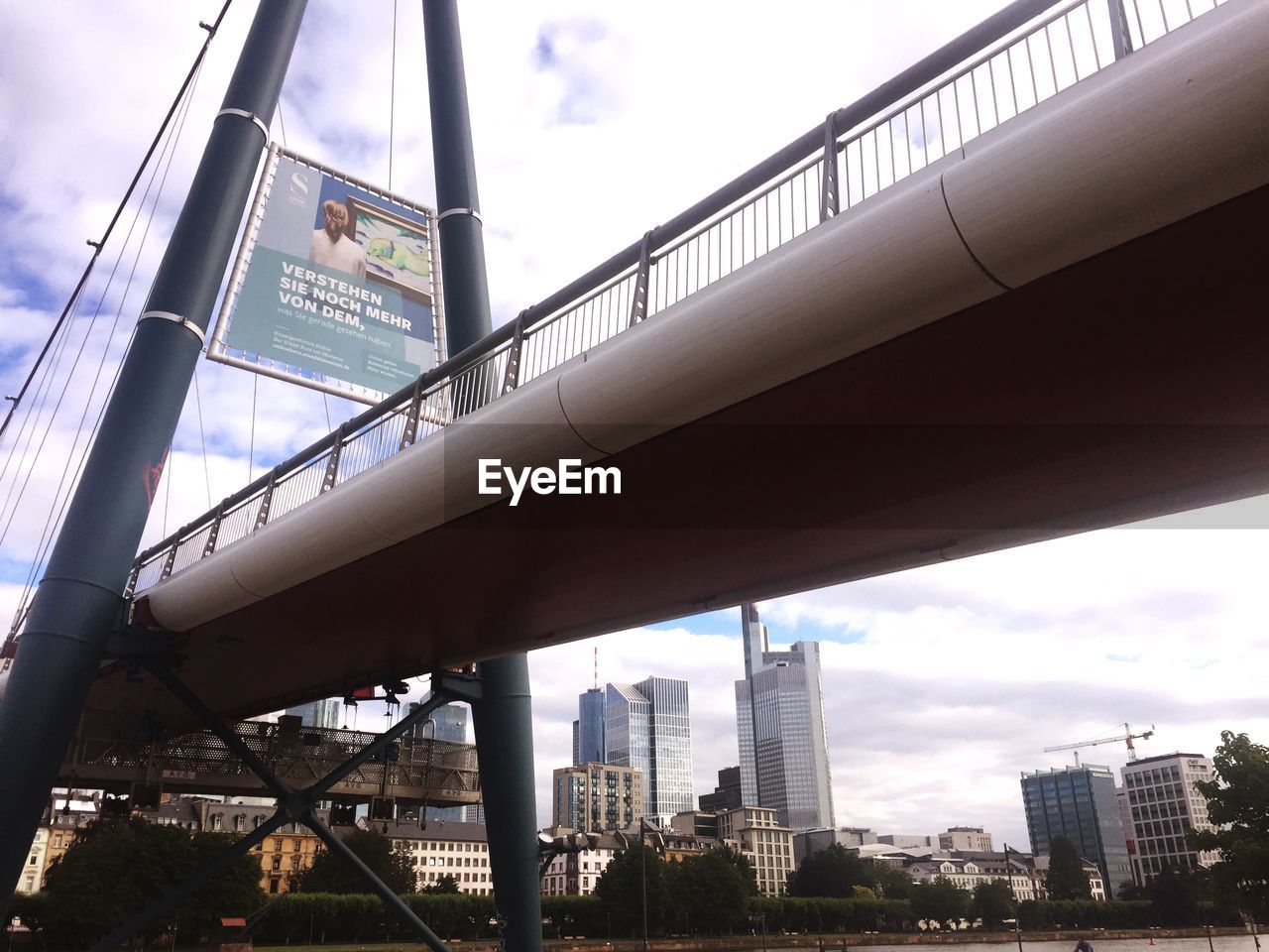LOW ANGLE VIEW OF EIFFEL TOWER AGAINST SKY
