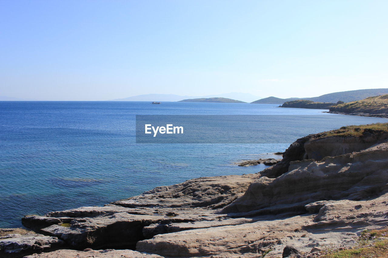 Scenic view of sea against clear sky