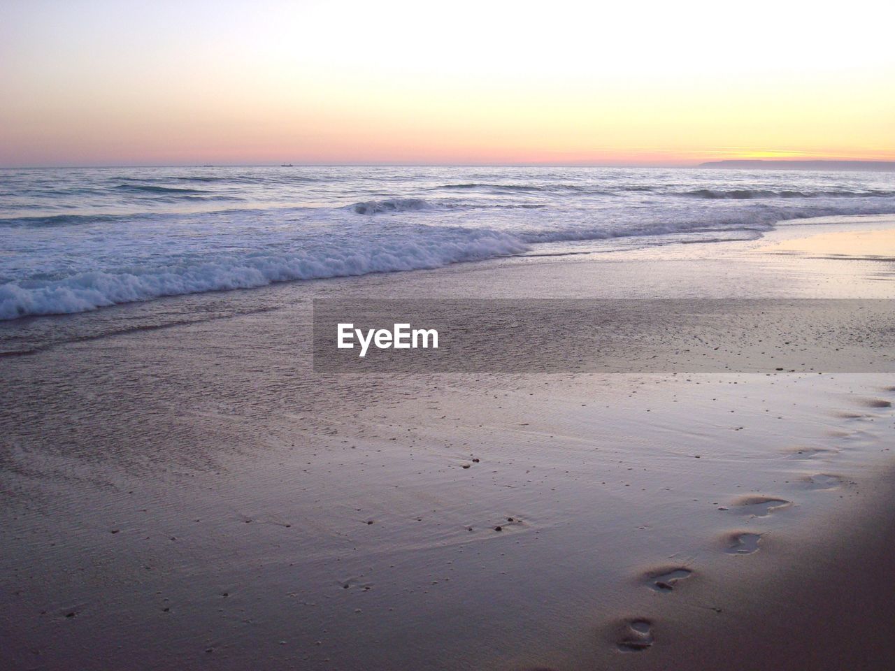 Scenic view of sea during sunset