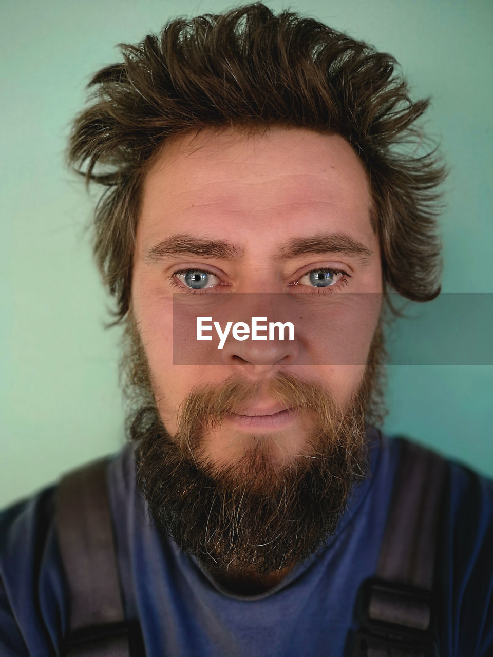 Close-up portrait of bearded man