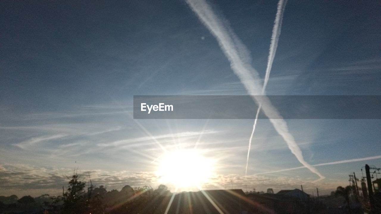 VIEW OF VAPOR TRAIL IN SKY