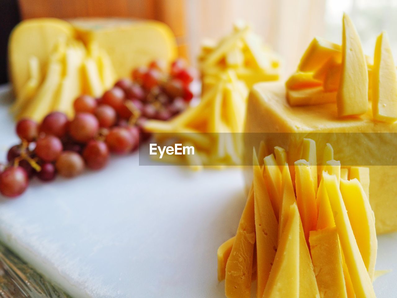 Close-up of fruits on plate cheese 