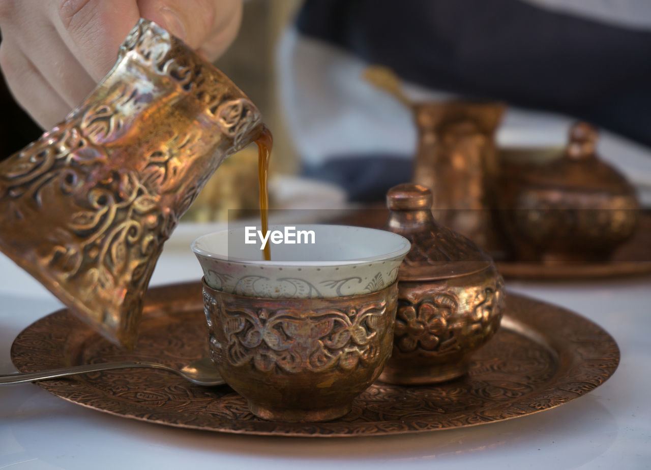 Close-up of turkish coffee cup on table