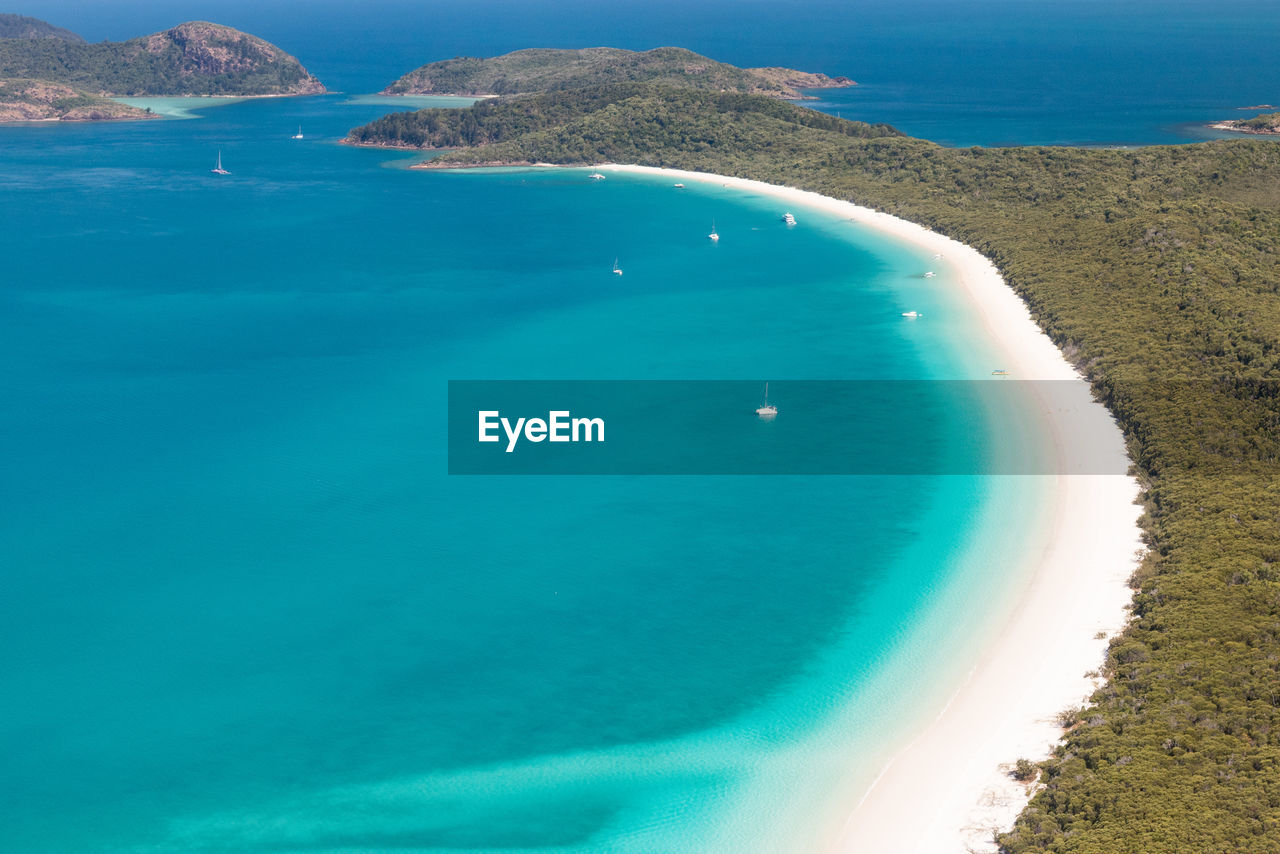 Scenic view of sea against blue sky