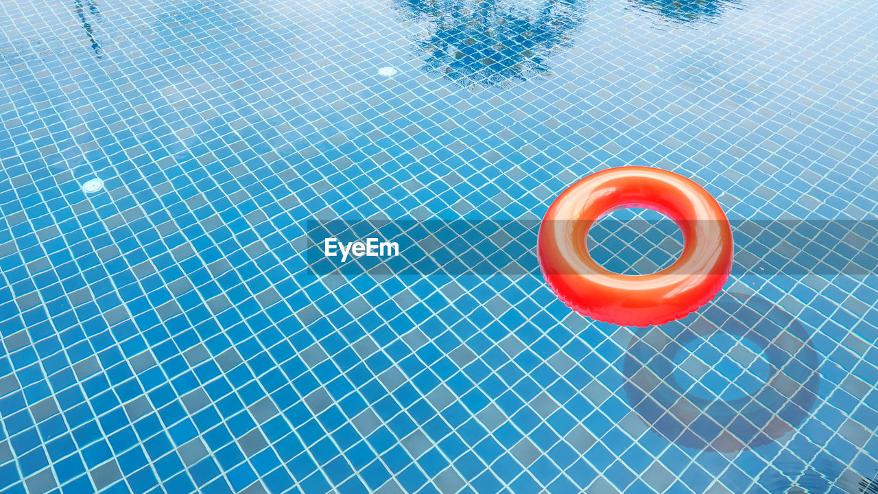 High angle view of inflatable ring in swimming pool