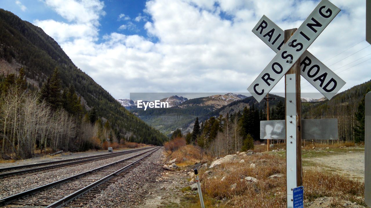Railroad track with mountains in background