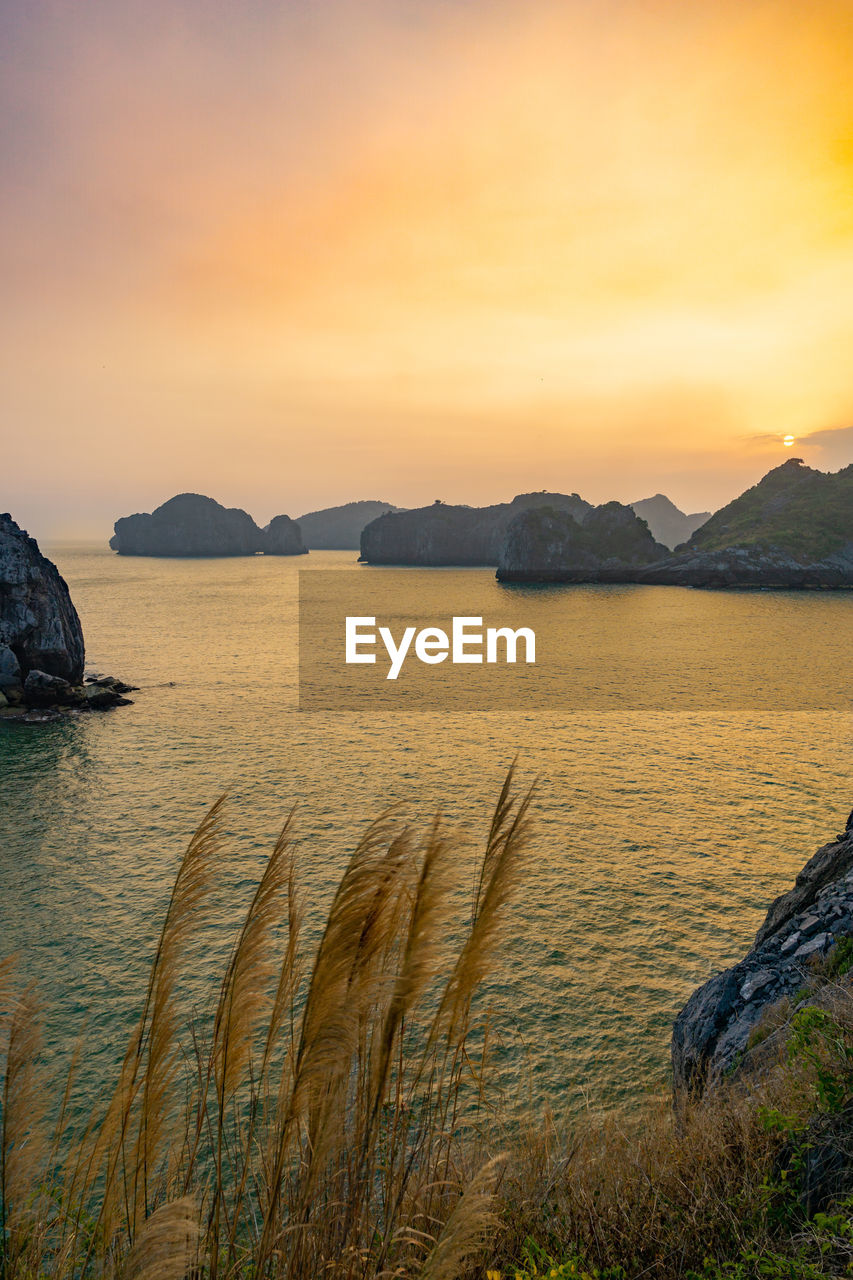 Scenic view of sea against sky during sunset