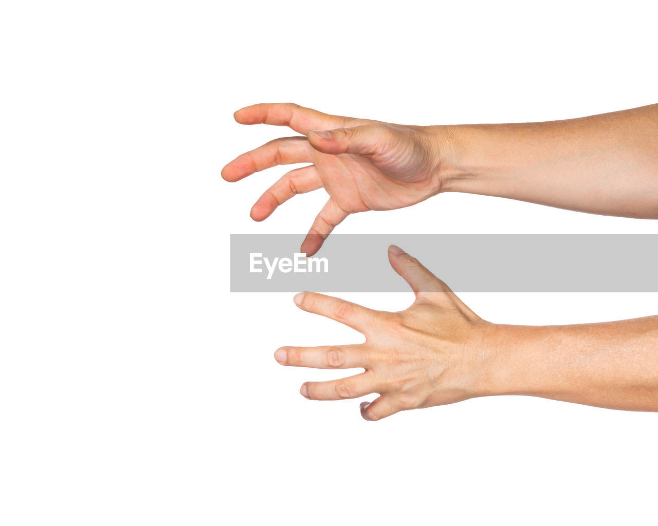 Close-up of cropped hands gesturing against white background