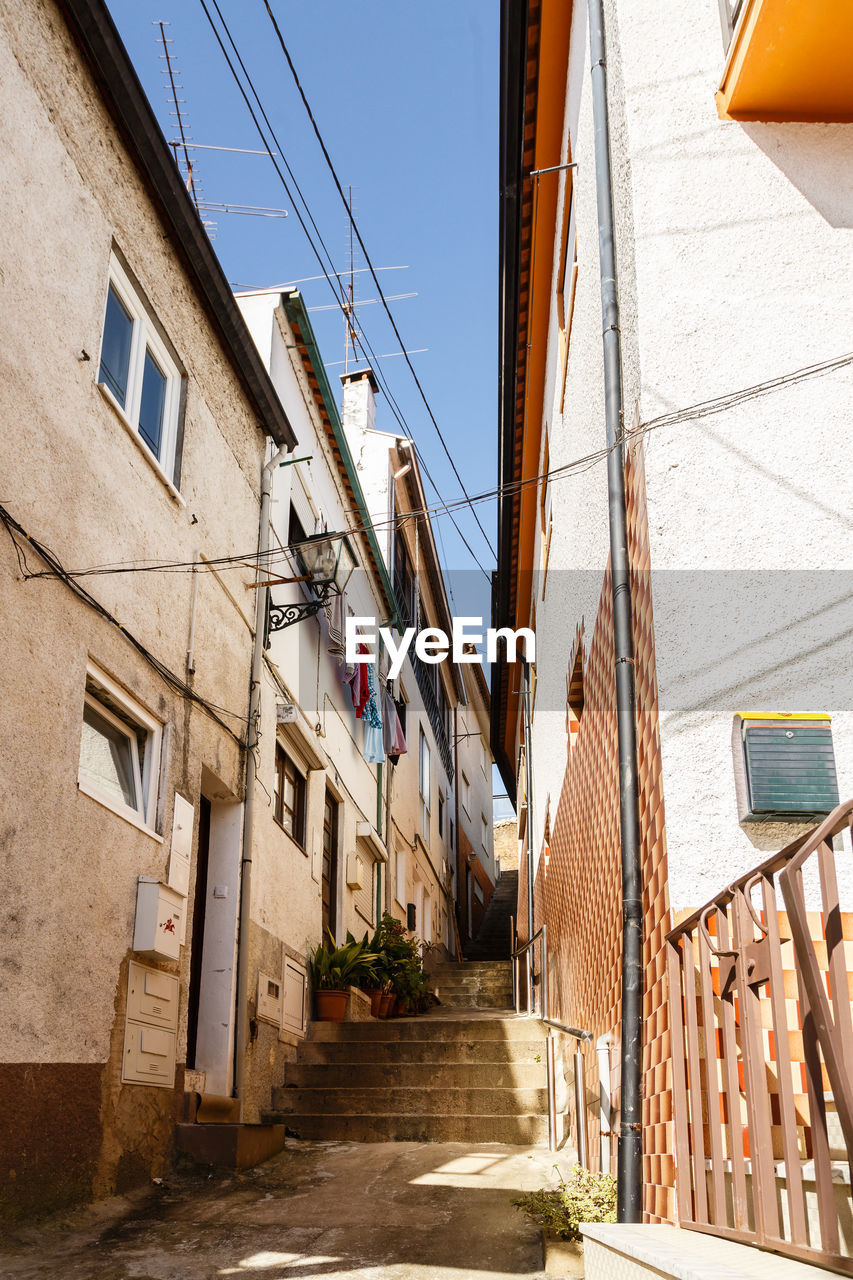 Alley amidst houses