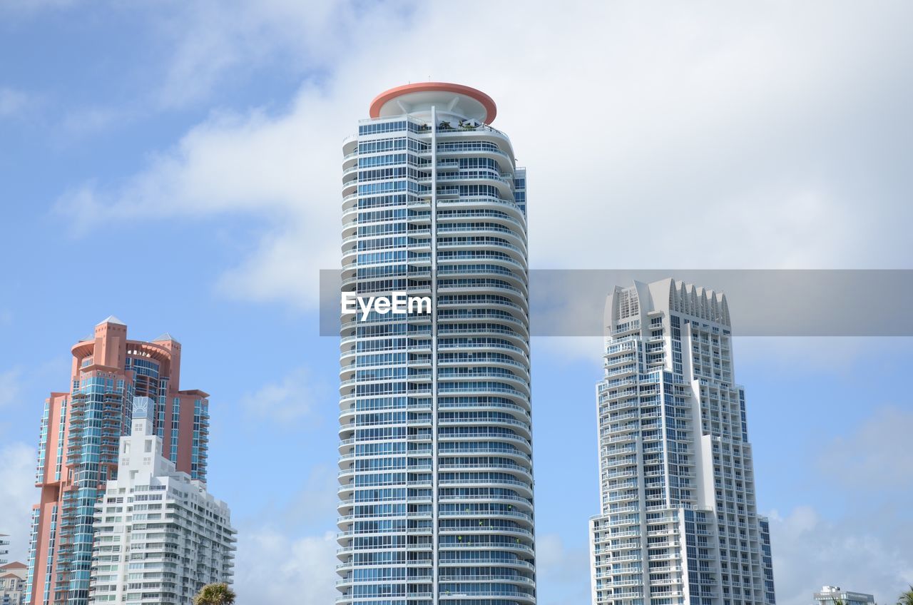 Low angle view of modern buildings against sky