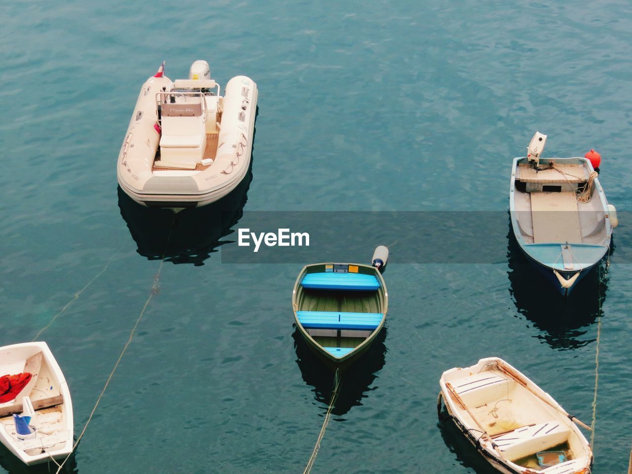 BOATS MOORED IN WATER