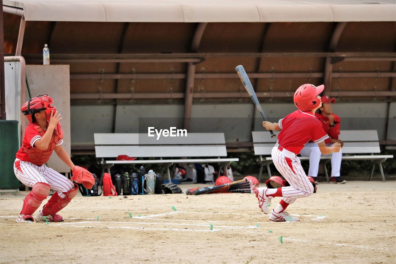 Boys playing baseball