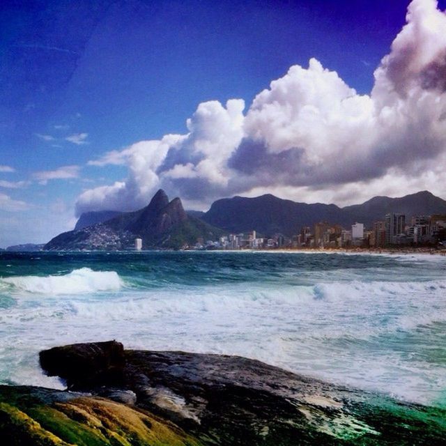 VIEW OF SEA AGAINST CLOUDY SKY