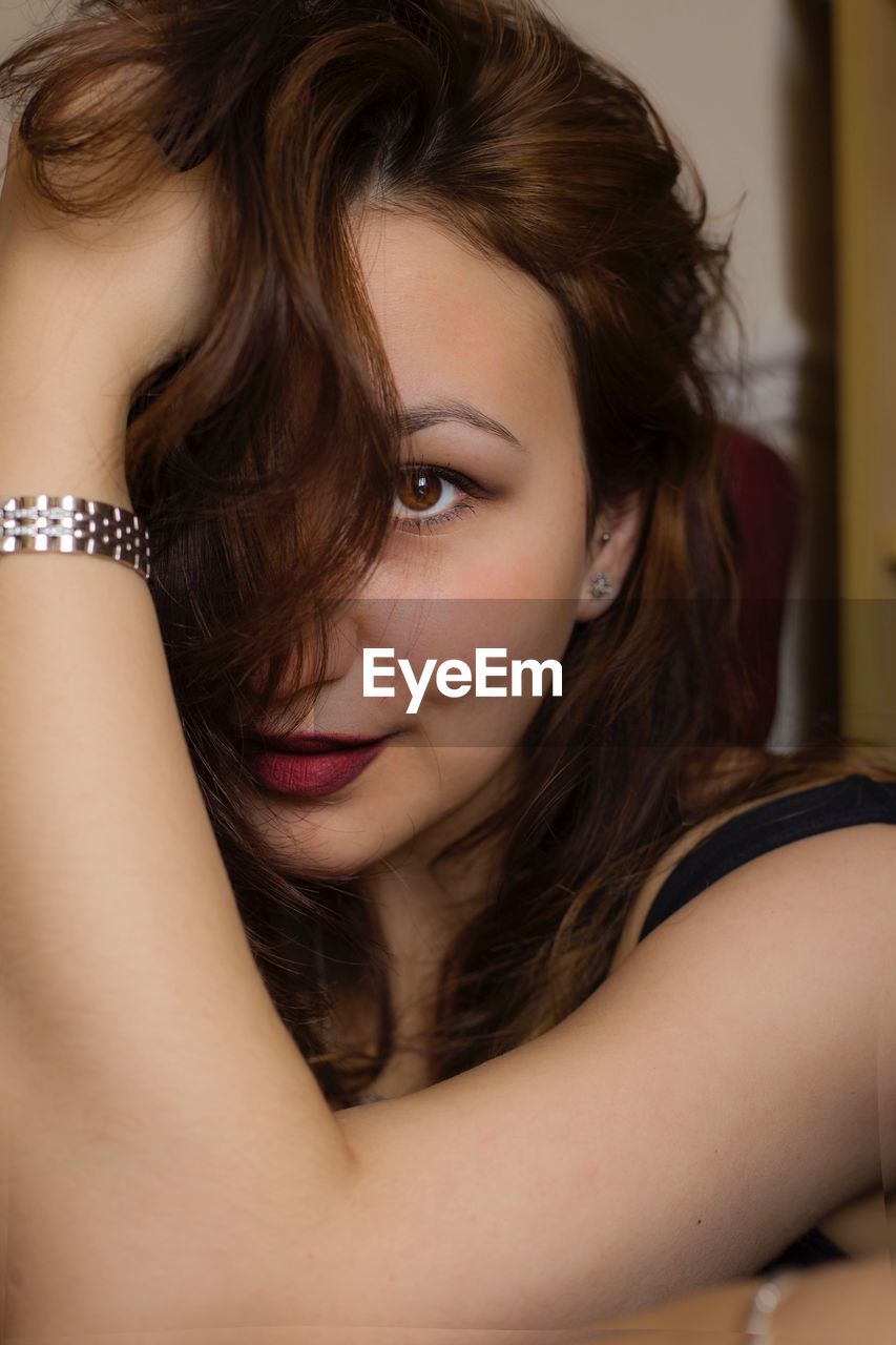 Portrait of beautiful woman with brown hair