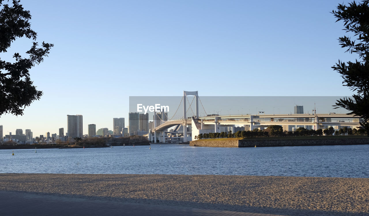 Rainbow bridge going over tokyo bay in tokyo, japan