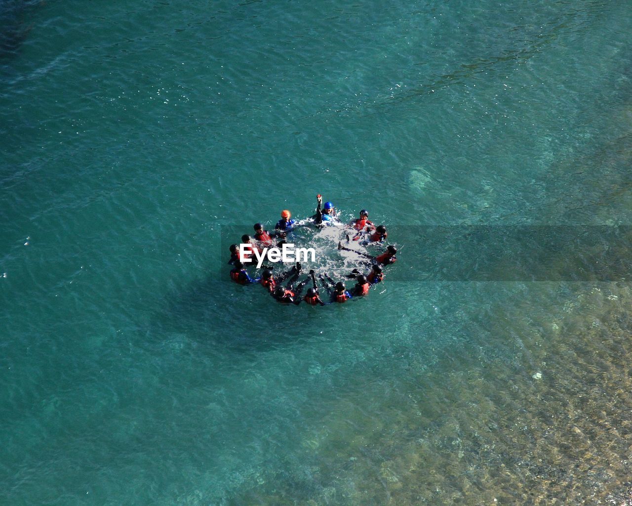 High angle view of people on boat in water