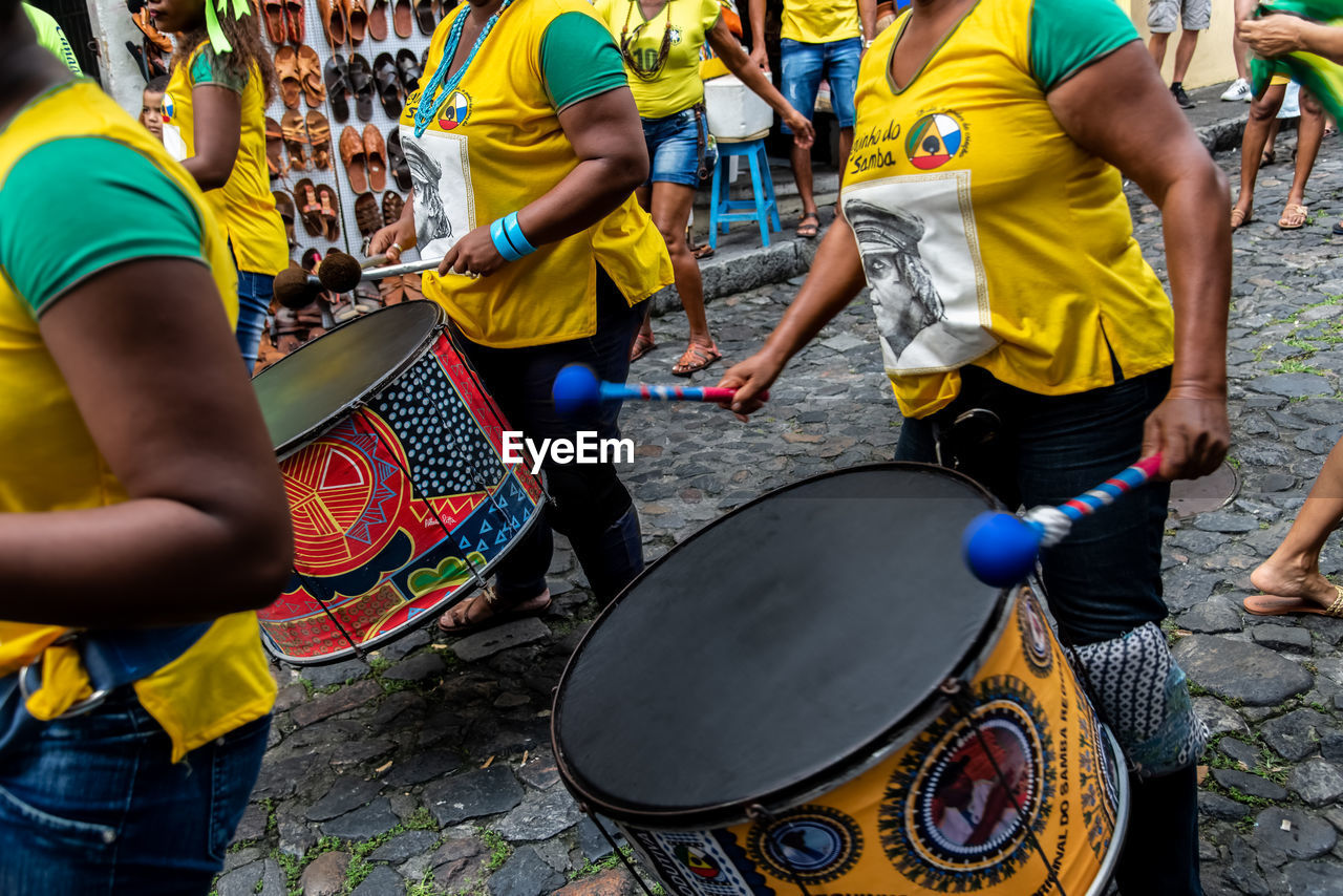 Dida band members play percussion instruments at pelourinho in salvador, 